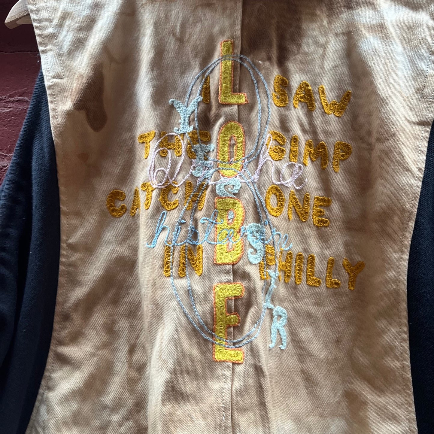 Synch Vest - Persimmon Canvas With Chainstitch Text Smear #1