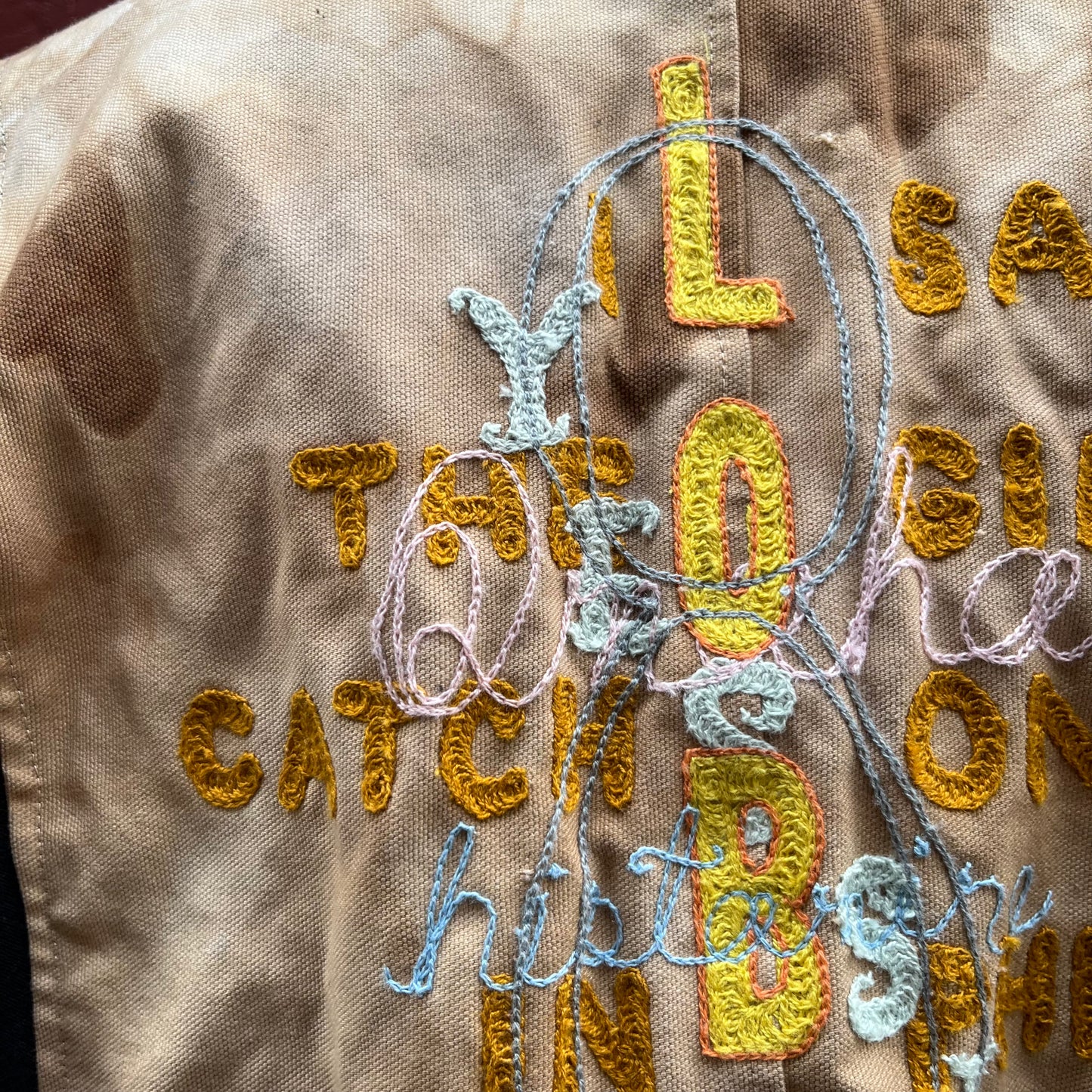 Synch Vest - Persimmon Canvas With Chainstitch Text Smear #1